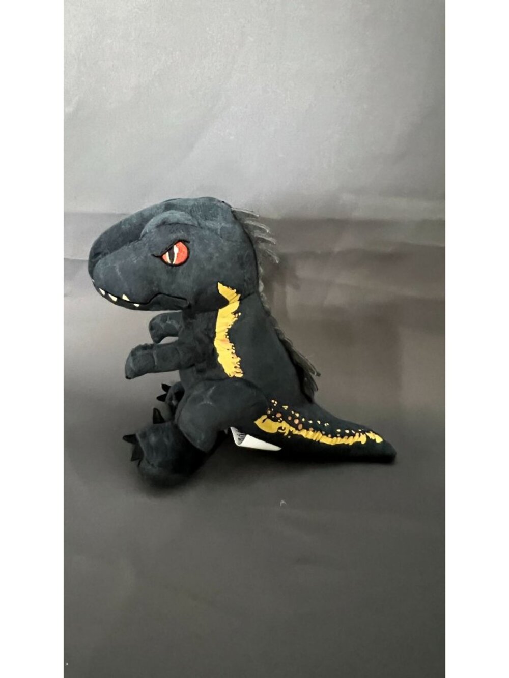 Jurassic World Rebirth Black Dinosaur Plush Toy 12" With Yellow Details & Red Ey